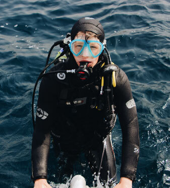 boy scuba diving bone island divers